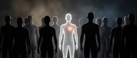 Glowing human figure with red heart stands out among dark silhouettes in dramatic lighting. Leadership, uniqueness, and emotional connection concept.