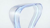 Futuristic transparent chair with glowing blue edges, sleek organic curves, modern minimalist furniture design on a light background.
