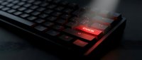 Glowing red delete key on dark keyboard with smoke effect creating dramatic cybersecurity and data protection concept for digital security designs.