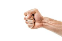 Male caucasian fist isolated on white background showing strength, power, and determination. Ready for design projects and commercial use.