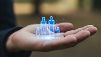 Holographic family figures floating above open palm representing life insurance protection and healthcare coverage for loved ones.