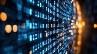Digital matrix of glowing blue numbers and code on dark background with orange light bokeh effect, creating futuristic technology visualization pattern.