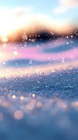 Soft focus bokeh background with layered glitter particles in blue, pink, and gold tones, creating an abstract dreamy atmosphere with warm sunrise light. Perfect for design projects.