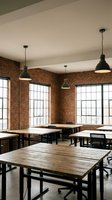 Modern industrial office space with exposed brick walls, wooden tables and pendant lighting for coworking and business meetings.