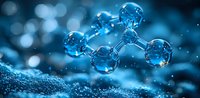 Molecular structure made of blue transparent spheres on dark background with bokeh effect and water drops. Scientific concept for chemistry and research.