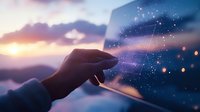 Magical starry sky constellation displayed on transparent glass screen with hand touching interface against sunset mountain landscape background.