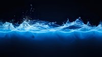 Dynamic blue water splash with glowing light effect against dark background, flowing liquid motion with droplets and waves creating abstract artistic pattern.