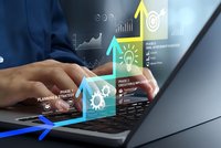Businessman using laptop with digital marketing analytics dashboard displaying growth charts, strategy planning icons and performance metrics overlay.