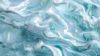 Swirling turquoise and white marble liquid pattern creates dynamic abstract background with flowing waves and organic textures for luxury design projects.