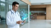 Male doctor using digital tablet with holographic medical icons in modern hospital lobby for healthcare technology and telemedicine applications.