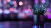 Glowing fiber optic plant in dark metallic pot against blurred bokeh background creates magical atmosphere with pink and blue lights for modern decor.