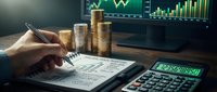 Financial planning concept with hand writing on documents, stacks of golden coins, calculator and trading charts on computer screen for investment analysis.