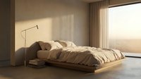 Minimalist bedroom interior with low platform bed, neutral bedding, floor lamp, and large window with warm natural light streaming through sheer curtains, suitable for interior design and home decor projects.