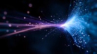 Glowing energy streams collide creating luminous explosion effect with blue and purple light rays, particles and bokeh on dark background.