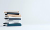 Stack of hardcover books in neutral colors against light background with copy space, minimalist composition for education and reading concepts.