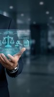 Businessman hand presenting legal tech holographic interface with scales of justice and digital contracts for modern law practice innovation.