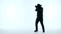 Male photographer silhouette taking photos with camera against white background, professional shooting pose for creative projects and design work.