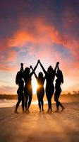Silhouettes of five women holding hands with raised arms celebrating friendship on beach at sunset with dramatic orange and purple sky clouds.