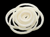 Sliced white onion rings arranged in a spiral rose shape, isolated on transparent background, ready for food design, stickers, t-shirt design, and print on demand use.