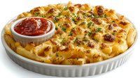 Creamy baked macaroni and cheese casserole topped with crispy breadcrumbs and fresh herbs, served with marinara sauce in white ceramic baking dish.