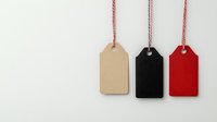 Minimalist hanging price tags in beige, black and red colors with red and white striped cord on white background, arranged in row. Clean retail design concept.