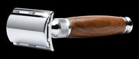 Classic safety razor with polished chrome head and textured wooden handle, isolated on transparent background. Ready for grooming product clipart, stickers, and t-shirt design use.