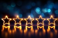Glowing neon star lights in row against dark background with blue bokeh effect and warm reflection, creating festive holiday atmosphere.