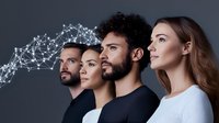 Diverse group of young professionals in profile view with digital network visualization flowing above their heads against dark background, technology concept.