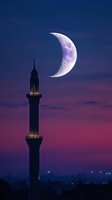 Crescent moon illuminating night sky over mosque minaret silhouette against purple sunset backdrop, with city lights glowing in distance.