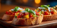 Fresh bruschetta topped with diced tomatoes, basil and herbs on toasted bread slices served on wooden board for appetizer menu and Italian cuisine.