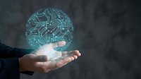 Hand holding glowing digital brain with circuit board pattern, representing artificial intelligence, technology innovation, and futuristic computing solutions for business.