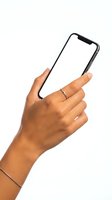 Female hand holding modern smartphone with blank white screen isolated on white background for mobile app mockup and digital technology presentation.
