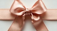 Elegant blush pink satin ribbon bow with delicate stitched edges on light background, isolated for design use in gift wrapping and decorative projects.