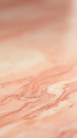 Soft pink marble texture with natural veining patterns and smooth gradient surface for luxury interior design and elegant backgrounds.