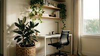 Modern home office workspace with floating shelves, green plants, ergonomic chair and natural lighting creating productive work environment for remote professionals.