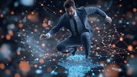 Young Caucasian businessman in suit jumping on glowing digital platform with network connections and orange light particles in dark futuristic environment.
