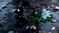 Glowing green gear mechanism on dark wet surface with water drops and dramatic lighting creates futuristic industrial mood with bokeh light effects.