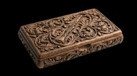 Ornate wooden box with intricate carved floral and scrollwork details on transparent background, ready for design use in print-on-demand, sublimation, clipart, and digital craft projects.