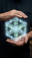 Male hands holding glowing neon cube with sound wave visualization and digital data elements, representing technology, innovation, and data management solutions.