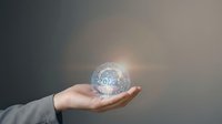 Caucasian hand holding glowing digital globe with network connections, representing global communication, technology innovation, and worldwide business connectivity for corporate and digital marketing use.