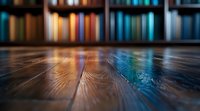 Wooden table surface with blurred bookshelf background creating atmospheric bokeh effect. Warm and cool tones blend in library setting, highlighting wood grain texture.