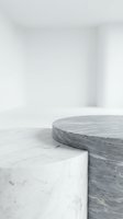 Minimalist marble podiums in white and gray tones on a clean background, elegant stone pedestals for luxury product display and presentation.
