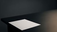 Blank white paper sheet on dark black table surface with dramatic lighting and shadows, suitable for mockups and design presentations.
