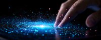 Fingers touching glowing blue particles in dark space creating magical light effect with sparkles and energy waves against black background.