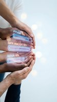 Diverse male hands holding glowing neon progress bars displaying skill levels in Python, data analysis, and design. Represents professional development, tech training, and career growth for business and education use.