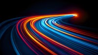 Colorful light trails curving into distance on dark background, glowing neon streaks of red, orange and blue creating dynamic motion path effect for technology concept.