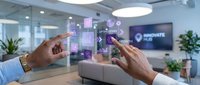 Two hands interact with holographic digital interface displaying business analytics, charts, and innovation icons in modern office workspace.