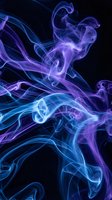 Abstract purple and blue smoke swirls creating fluid motion patterns against black background for modern design projects and creative compositions.