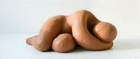 Abstract organic clay sculpture with flowing curves and rounded forms on neutral background for modern art and design projects.