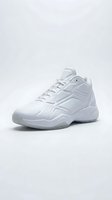 White mid-top basketball sneaker with textured panels, lace-up closure, and translucent sole, isolated on light background for footwear and sport fashion use.